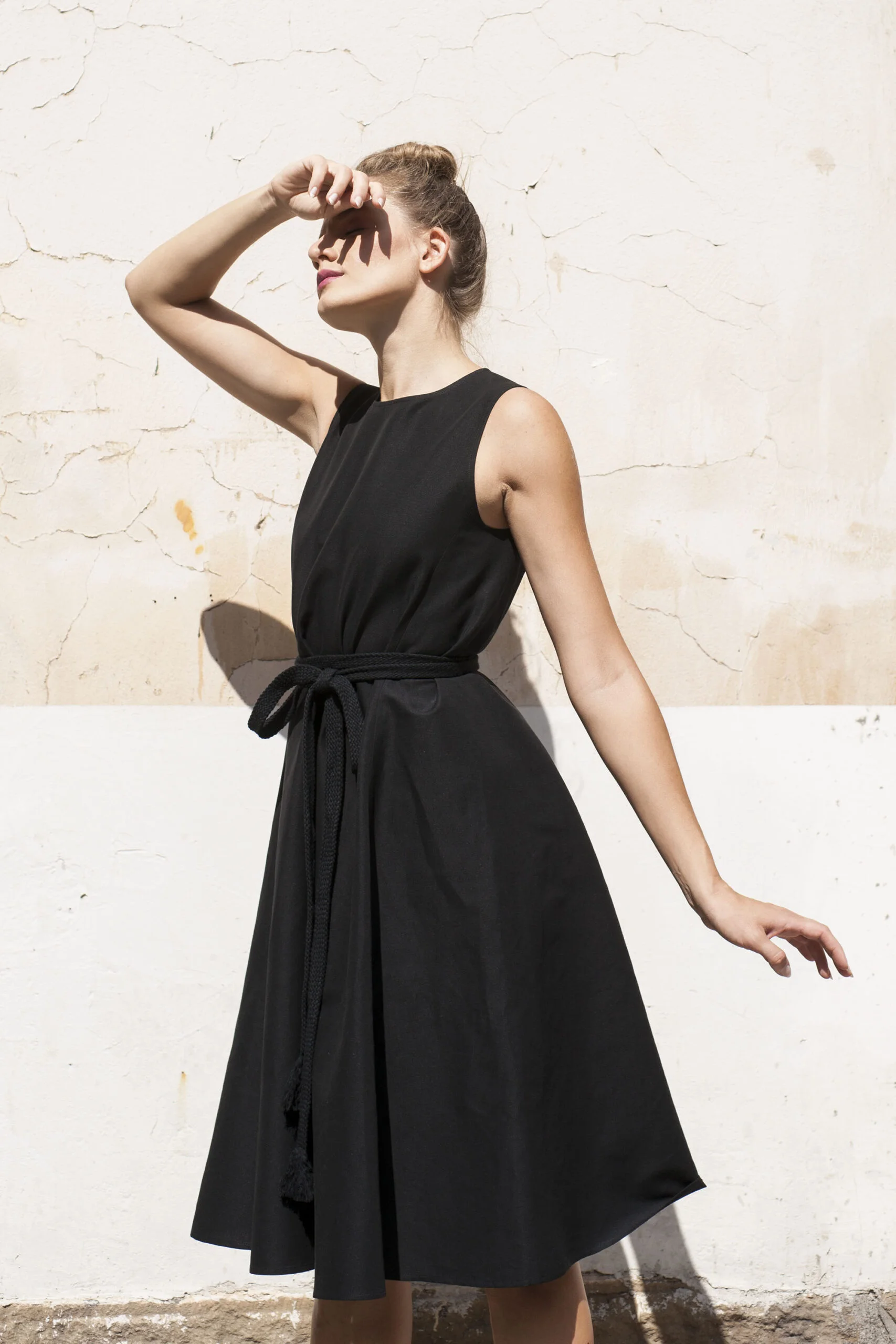 A shaped black linen dress with a belt side scaled • Sassa Björg