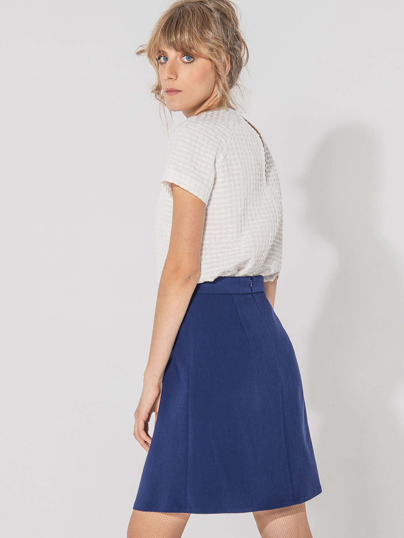 a shaped pleated skirt in cobalt blue side uai • Sassa Björg