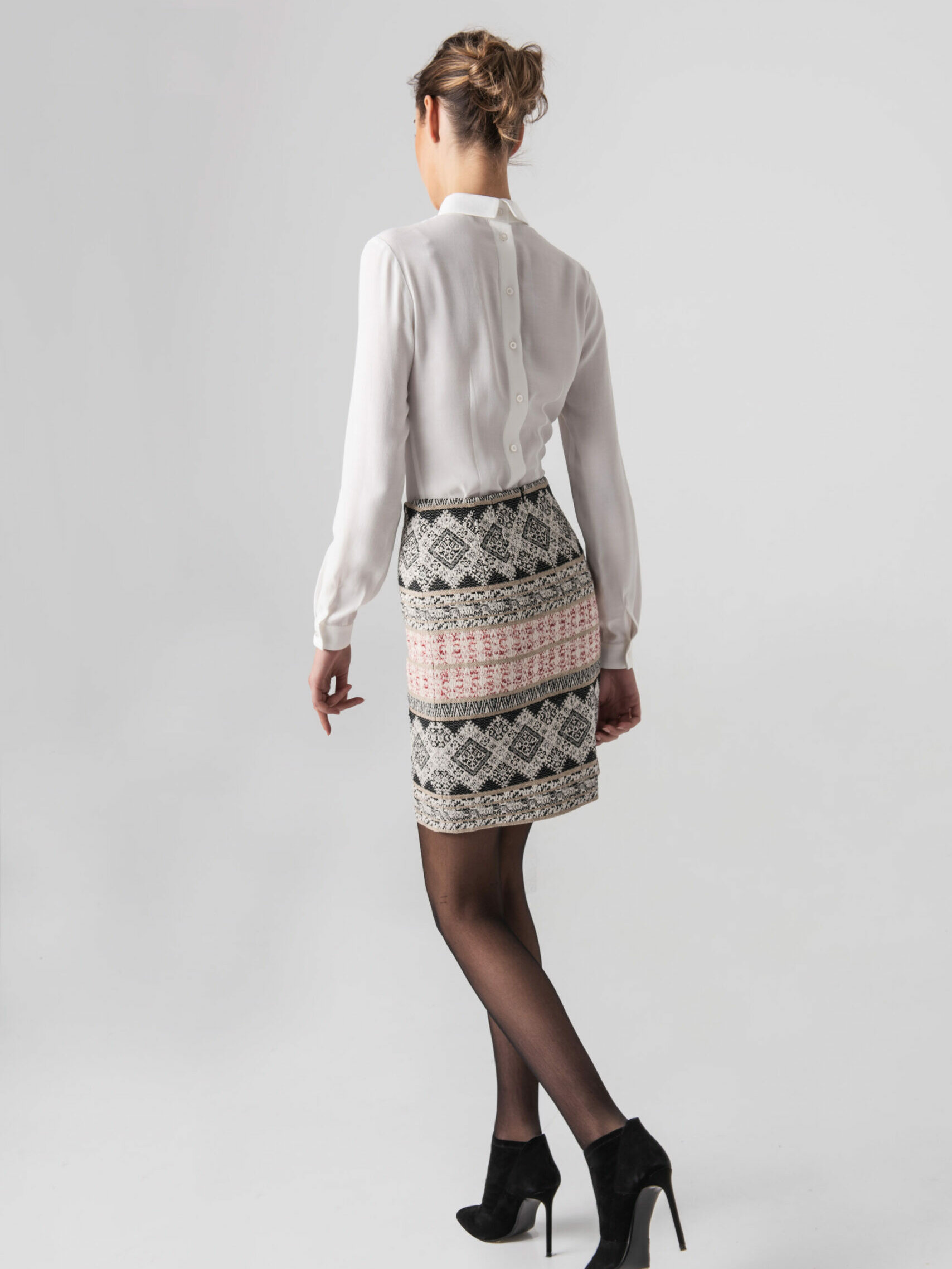 Straight mini skirt with etno motif walking scaled uai • Sassa Björg