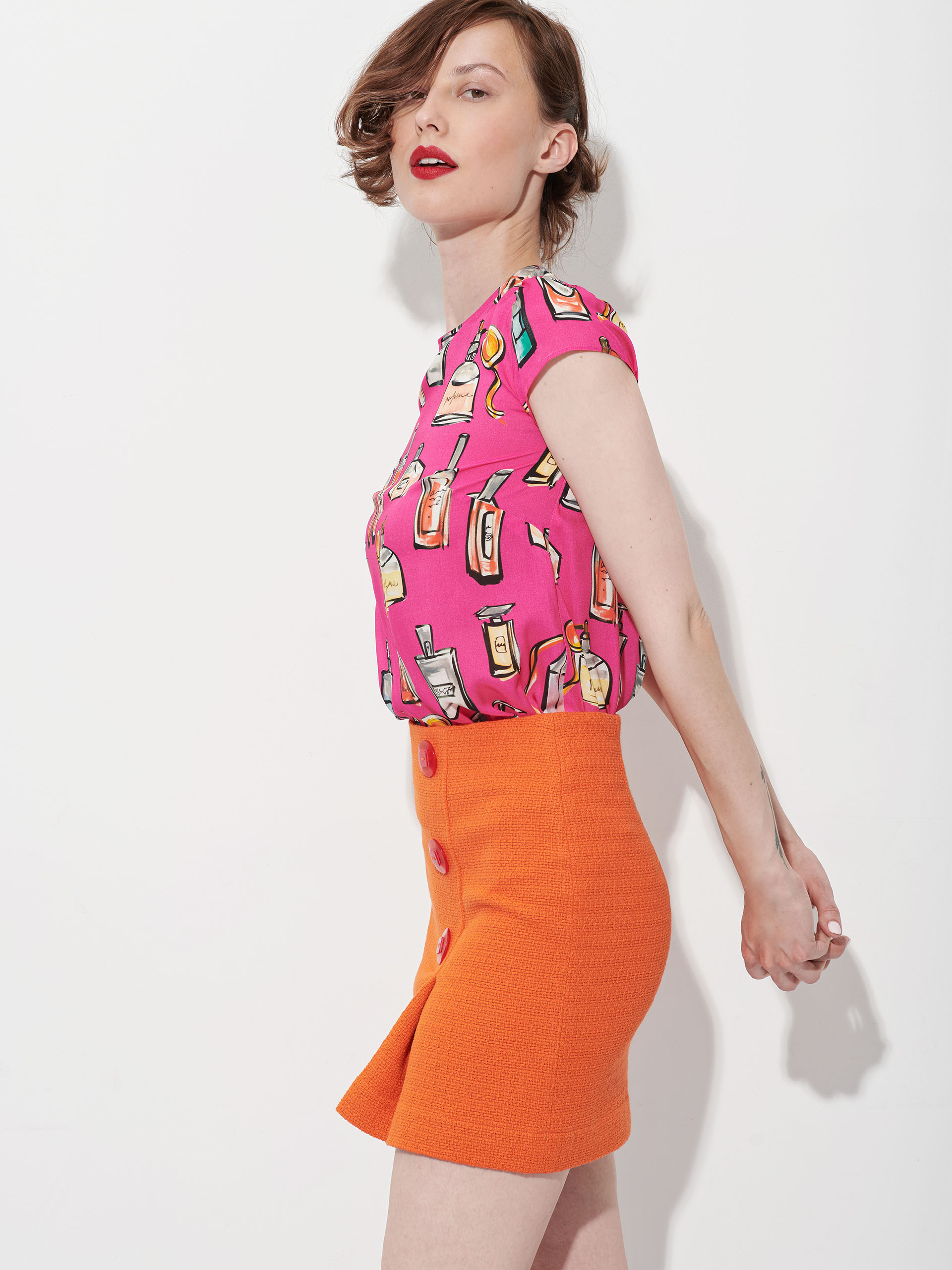 orange straight mini skirt with buttons side • Sassa Björg