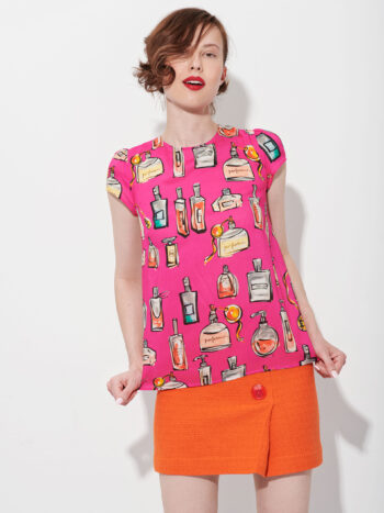 orange straight mini skirt with buttons untucked • Sassa Björg