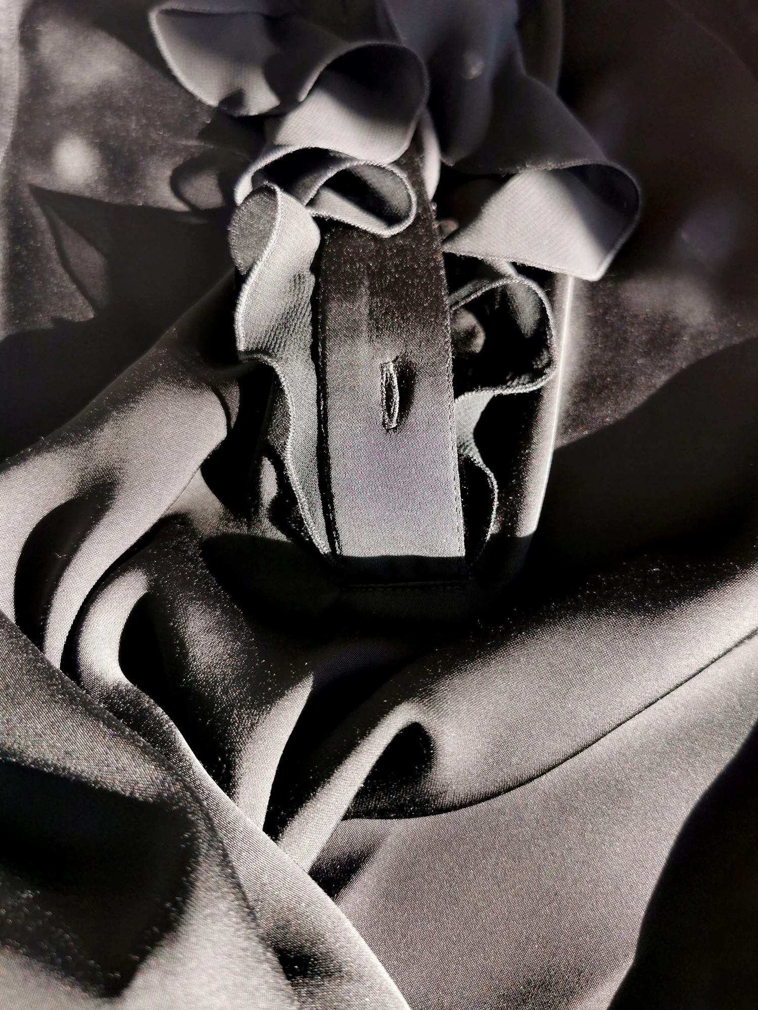 sleeveless black jabot ruffle top fabric • Sassa Björg