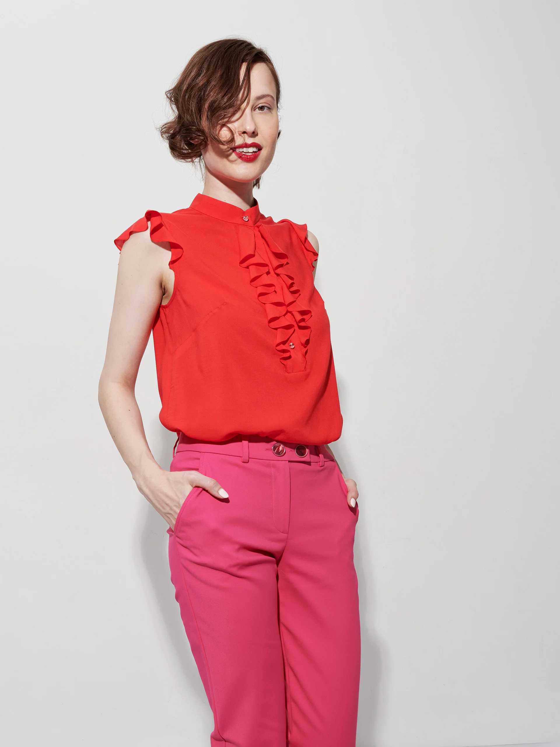 sleeveless crimson red jabot ruffle top featured • Sassa Björg