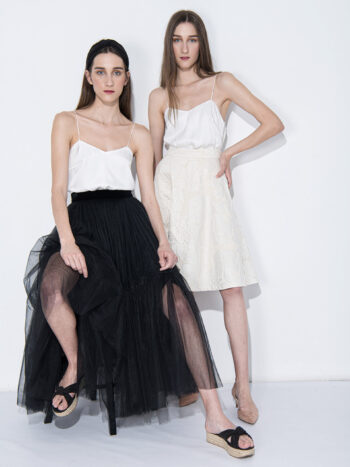 white strappy top twins sitting • Sassa Björg