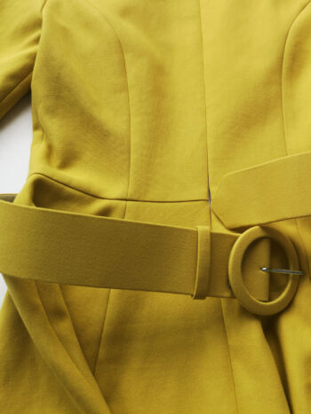 Mustard yellow dress with a belt closeup • Sassa Björg