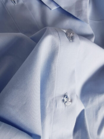 light blue shirt w exaggerated bow fabric • Sassa Björg