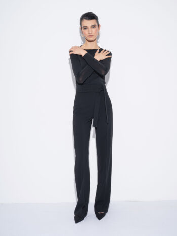 black pants with stretch arms crossed • Sassa Björg